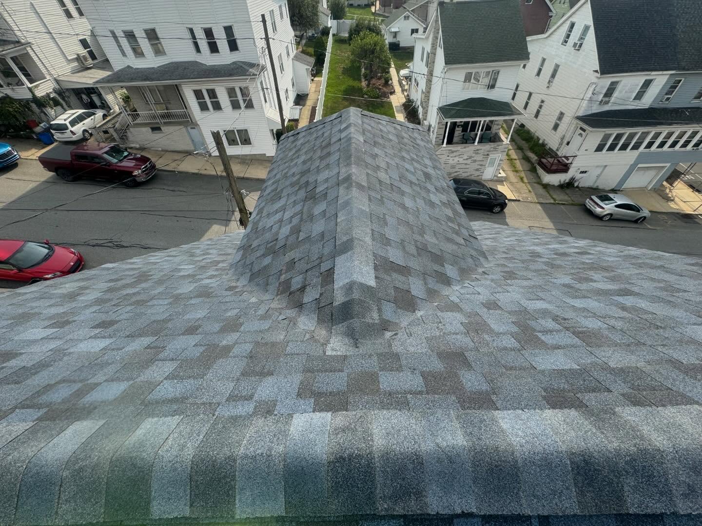 Complete shingle roof replacement service showing quality asphalt shingle installation in Hazleton, PA