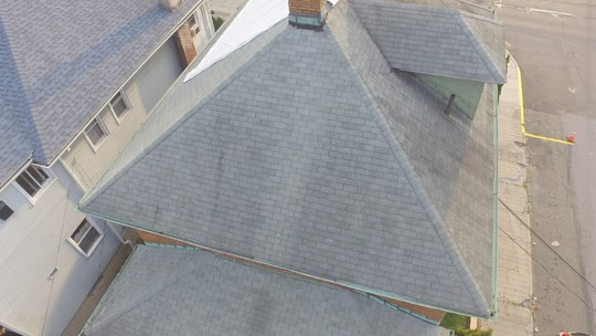 Residential roofing and construction project showcasing quality workmanship and attention to detail